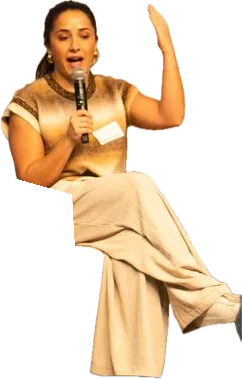 Annamarie Galante speaking into a microphone on a panel